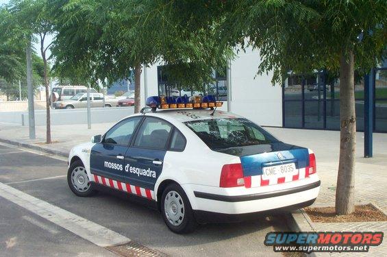 Police car with "mossos d'esquadra" text and license plate CME 6035