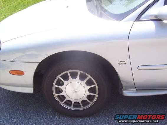 dents.jpg Here are a few dents and scratches which I am going to have fixed as soon as i get a paint job.