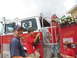 1995 Ford C-350 (Centurion Conversions) - A fire truck with children and an adult poses for a photo, with a badge indicating 'LINGOHOCKEN 35 95'.