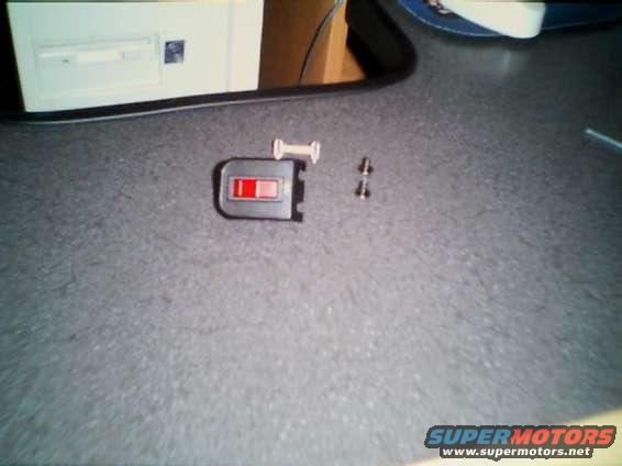 switchpic.jpg a switch for the interior of the car. for the neons and strobes in the trunk