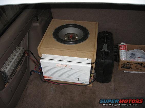 The 12" Rockford Fosgate in a 3/4 MDF custom made box cut by a CNC router. There will be another sub put in the same box were the tool box is. The is a little too much airspace for just one. And i think 2 12's will fill it in good, and make the sound better.