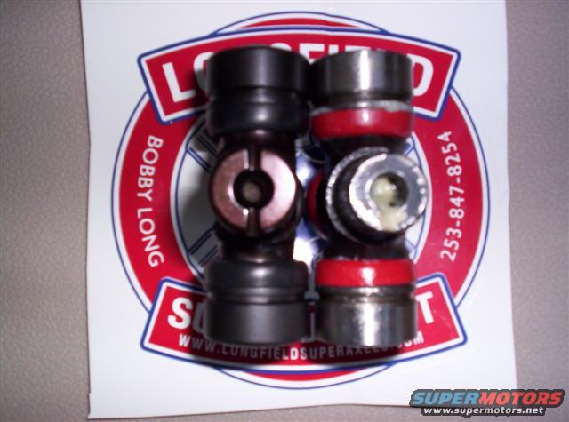 Two universal joints on a sticker with "BOBBY LONG" and "LONGFIELD SUPERAXLES" text