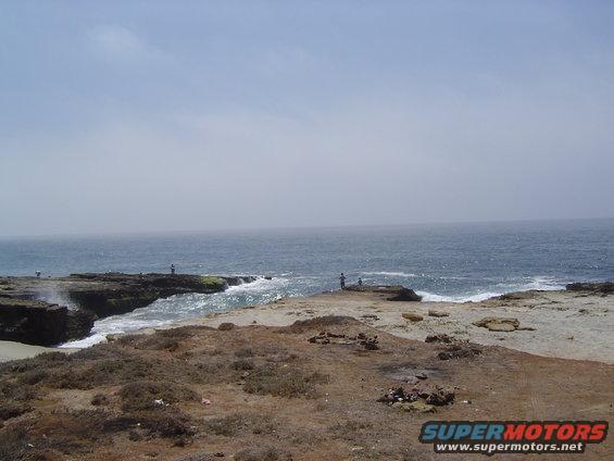 Coastal scene with rocky shore and ocean waves