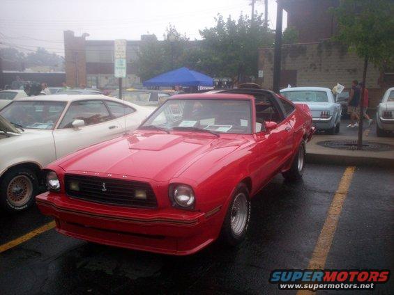 Red 1978 Ford Mustang II 3q-front view with hood scoop
