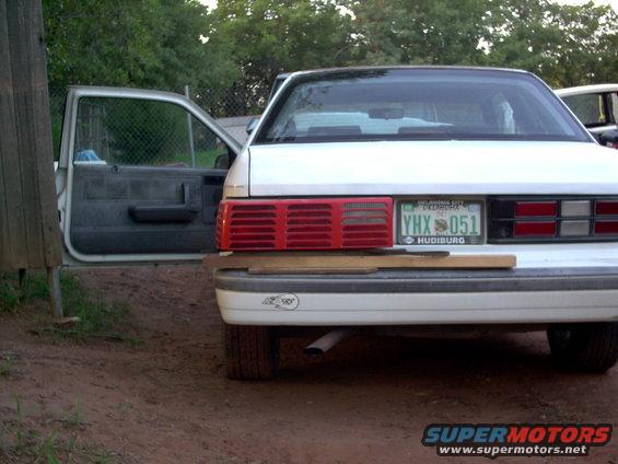 1990 Dodge Shadow rear, white, open driver's door, license plate YHX 051