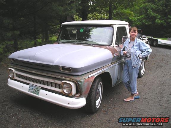 1960 Chevrolet C10 pickup truck, primer hood, white bumper, license plate 218-2252