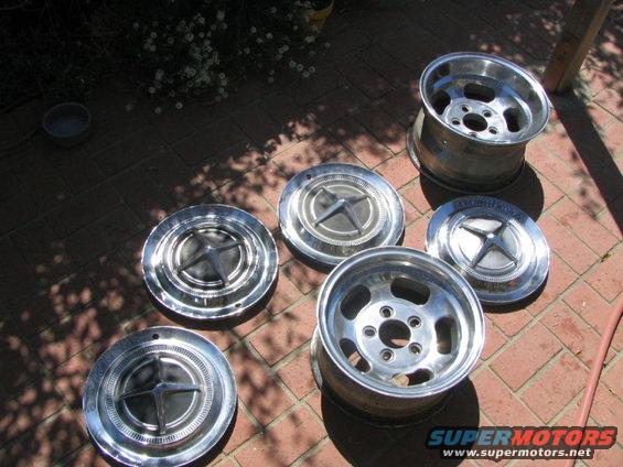 Early Dart wheelcovers.