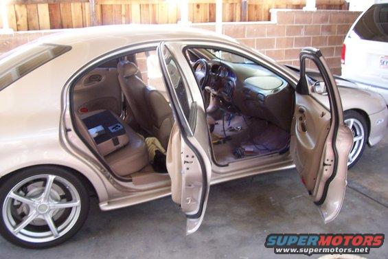 Tan 1998 Mercury Sable interior with doors open