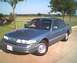 1994 Ford Crown Victoria - This 1994 Ford Crown Victoria is shown in a 3/4 front view under a clear sky.