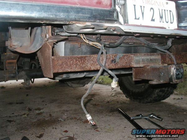 gas tank really exposed now.  I am going to redo the drawtite higher up and try and raise the gas tank the 3 inches to match the body lift.