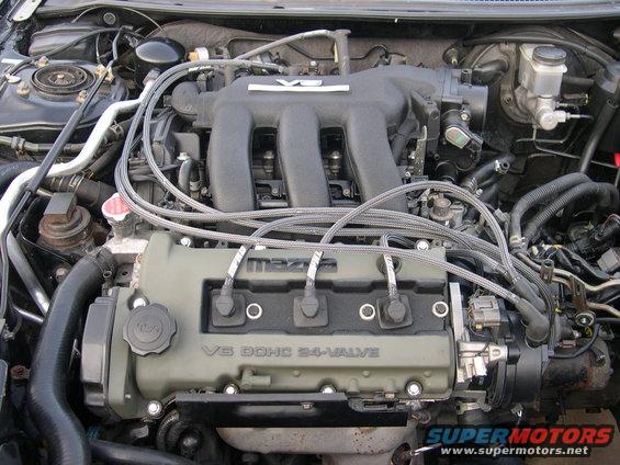 Mazda V6 DOHC 24-valve engine with black intake manifold and green valve cover
