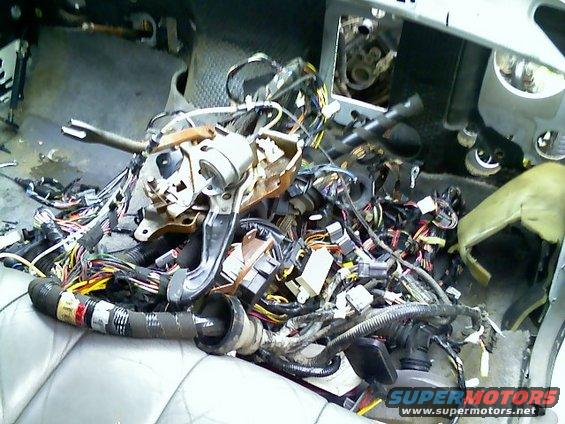 Interior wiring harness exposed on a car seat