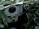 2002 Ford Crown Victoria - The firewall and engine bay are exposed, with various hoses and mechanical parts visible in the image.