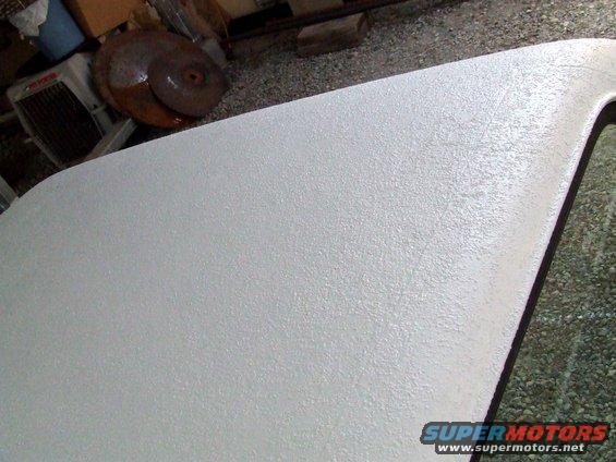 White textured roof panel with Supermotors.net watermark