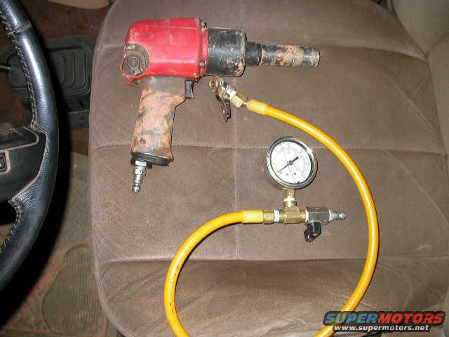 dscn5247.jpg A couple of things that never leave the truck.  A Harbor Freight impact wrench and my home made tire filling rig.
