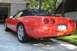 1994 Chevrolet Corvette - This red convertible sports car has a distinctive rear design with quad taillights.