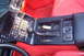 1994 Chevrolet Corvette - Interior view of a 1994 Chevrolet Corvette's center console, showing the shifter and controls.