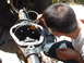 1994 Jeep YJ - A person inspects the gears within a vehicle's differential assembly.