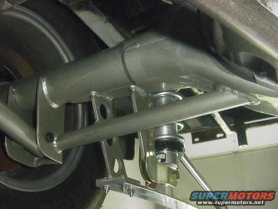 Rear suspension with adjustable coilover shock absorber