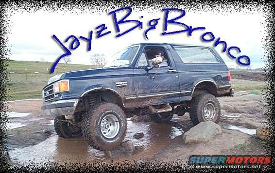 Lifted Ford Bronco driving through mud and rocks. Text overlay says 'Jayz Big Bronco'
