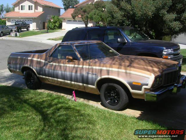 dscn1736.jpg The other side with the new tires and wheels