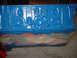 1969 Ford Mustang - Engine block painted blue, with masking tape applied to the lower section.