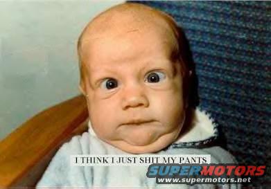 Baby with wide eyes and text overlay 'I THINK I JUST SHIT MY PANTS'. Supermotors.net logo visible
