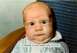 1999 Ford Crown Victoria - Baby's expression suggests a recent unpleasant event, with text confirming the suspicion.