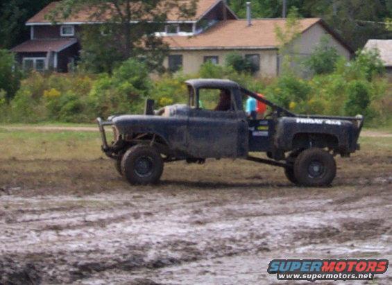 Black pickup truck with "FRIDAY 4X4" text on the side