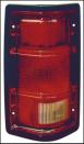 Red tail light assembly, looks like it has some text on a label inside