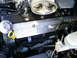 2003 Mercury Marauder - Close-up view of an engine bay, focusing on the valve cover and intake manifold.