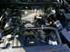 2003 Mercury Marauder - Engine bay components including intake, hoses, and coolant reservoir are pictured.