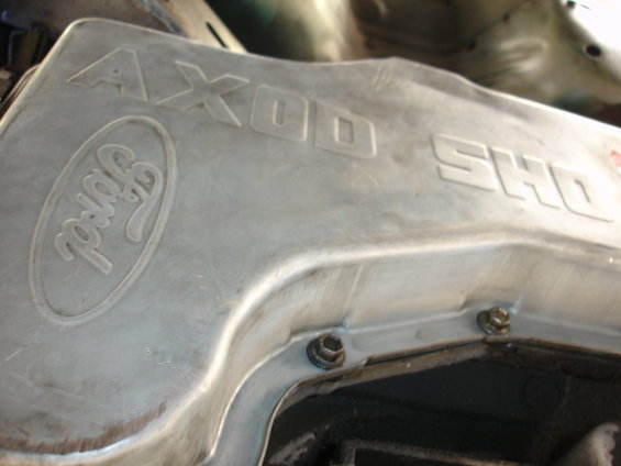 Silver Ford SHO engine cover with embossed Ford logo