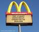 1978 Ford Mustang II - A McDonald's sign displays a message about Tony Stewart and Harley-Davidson motorcycles.