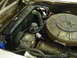 1960 Mercury Colony Park - Close-up view of a car's engine compartment, showing various mechanical components.