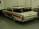 1960 Mercury Colony Park - This station wagon features a distinctive two-tone paint scheme with red side panels and a chrome roof rack.