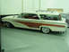 1960 Mercury Colony Park - This 1959 station wagon has a distinctive two-tone paint scheme with wood paneling and a roof rack.
