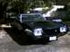 1972 Ford Ranchero - This black 1972 Ford Ranchero features a distinctive front end with quad headlights and a grille that matches its era.
