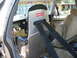 1985 Ford Crown Victoria LTD - The interior of a vehicle shows a racing seat with a Kirkey sticker and a racing harness.