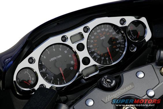 busa1b.jpg [i]By Arthur Jensen[/i]

[b]Blingin' Billet Bezel: We Install a  PPM Custom's Chrome Billet 'Busa Gauge Bezel[/b]

The Suzuki Hayabusa has made a name for itself as one of the fastest modern production sport bikes in existence, and coincidentally the most commonly modified. Named after the Peregrine Falcon, a bird known to exceed speeds of 175+ miles per hour, the 'Busa looks fast even when parked. For those enthusiasts seeking an eyeful of bling, form, and precision outside the ordinary, PPM Custom has unleashed their Hayabusa chrome billet gauge bezel that won't break the bank or void your factory warranty!

Compared to the plastic part it replaces, this chrome billet piece is pure eye candy.  We have worked on a lot of bikes over the years and the quality and fit of this piece is outstanding.  One thing that isn't readily apparent to most enthusiasts is how much better chrome looks on billet than on plastic.  Some 'Busa owners have resorted to flash chroming the stock plastic piece to brighten up the cockpit, but the flex of the plastic inevitably cracks the chrome, ruining the finish, not a problem with a billet part.

Even for the non-mechanical among us, the bezel goes on easy in about an hour.  No roll-a-way required here, the only tools you'll need are a 4mm Allen, one Phillips head screwdriver and one flat head screwdriver.
