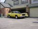 1978 Ford Ranchero - This yellow coupe utility has a distinctive grille and dual headlights, suggesting a 1977 model year.