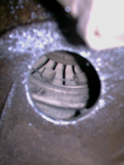 Close-up of a clutch pressure plate with visible spring fingers