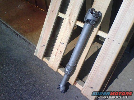 here is the driveshaft after sand blasting and before I Primed and  painted it chrome.  