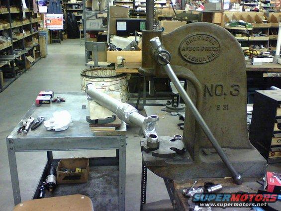 here is the set up I had used to disasemble and reassemble the driveshaft components.  I used an arborpress but many use hammers/vises etc to do the same .  