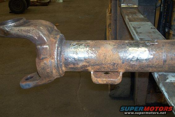 Rusted driveshaft yoke and tube with mounting bracket