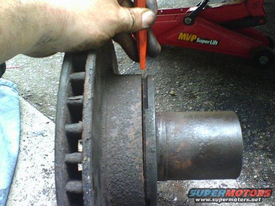 l3.jpg using the beveled edge inbetween the hub and rotor I separated the two.  