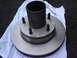 1989 Ford Bronco - here is the new brake rotor and the rehabed hub with bearings and grease inside.