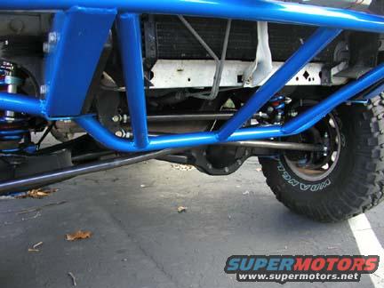 Blue roll cage over suspension and tire