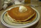 stack of pancakes with a pat of butter on top