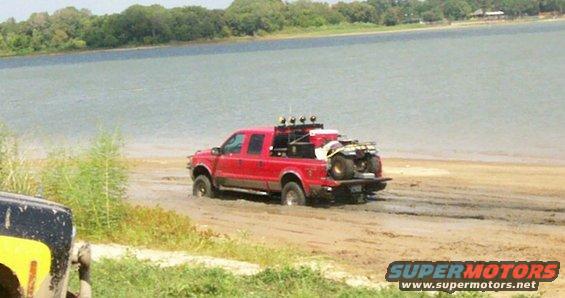 big-red-stopped-at-shoreline-mud-drag.jpg Big Red Ford coming to a stop at shore mud drag